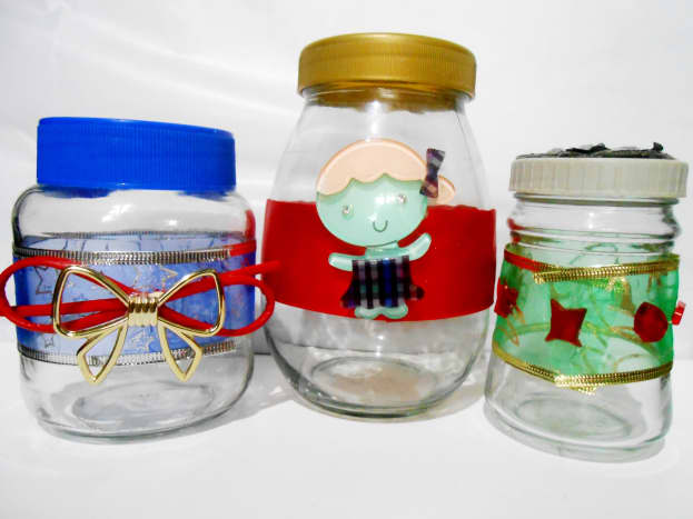 Recycled jars with ribbons and embellishments