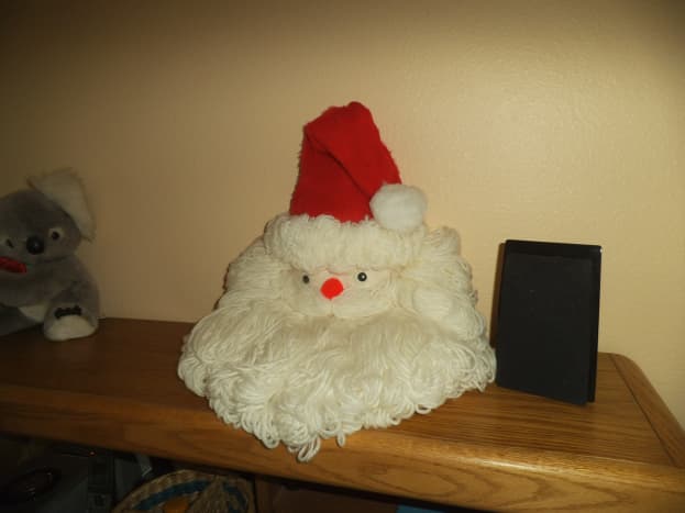 It's hard to chose the best place to display the yarn Santa face. It looks good anywhere you put it. 