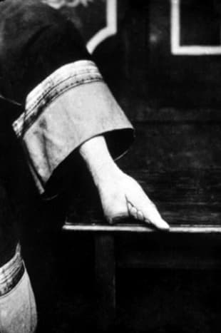 A bound foot was a hallmark of beauty. The actual foot was folded in half and tied down for years. This is the result that cannot be reversed.