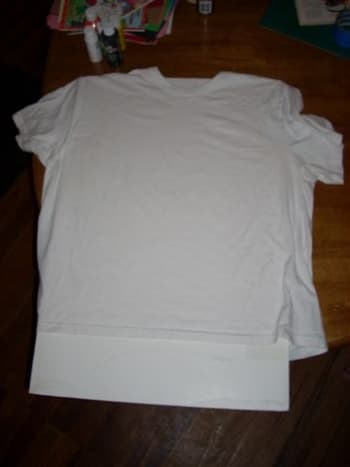 Insert cardboard or other thick paper into your shirt so it will not stick together.