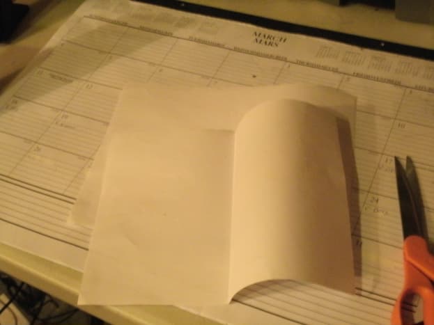Take a 8.5&quot;x11&quot; piece of paper, and fold it in half. 