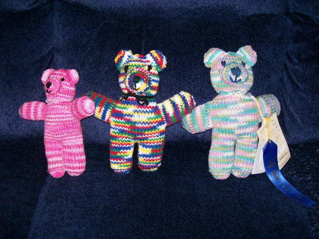 Colorful knit bears for babies...and one even won a blue ribbon at the fair.