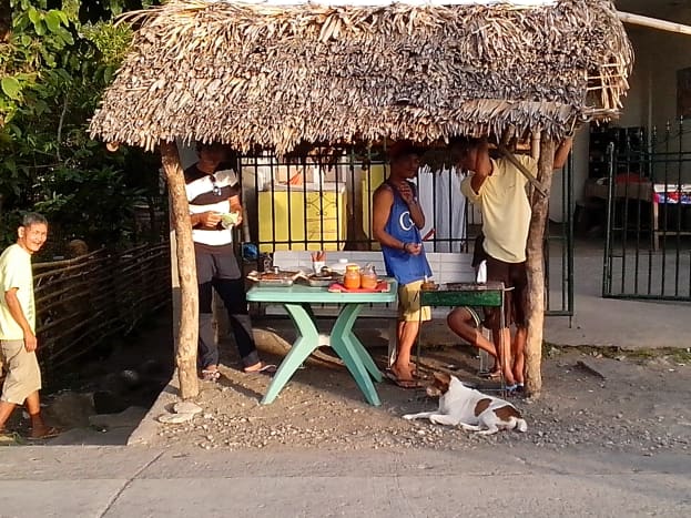 Teenagers having their cookout/barbecue business during Buswak Festival (Photo Source: Ireno A. Alcala)