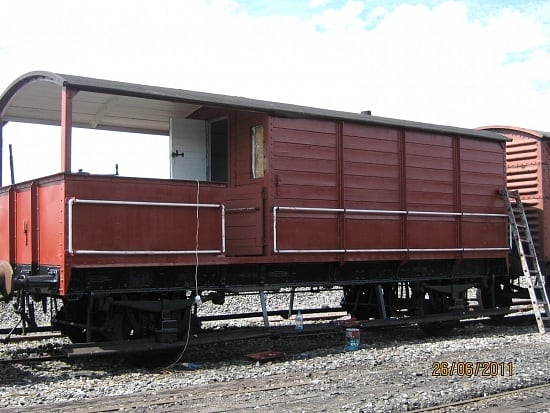 A restored fitted GW brakevan in original livery (lettering and numbering to be added)stands on the rails as an example of work undertaken by the Bury Standard 4 Group