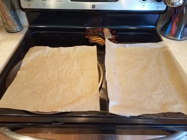 Preheat your oven and line your cookie sheets with parchment paper.