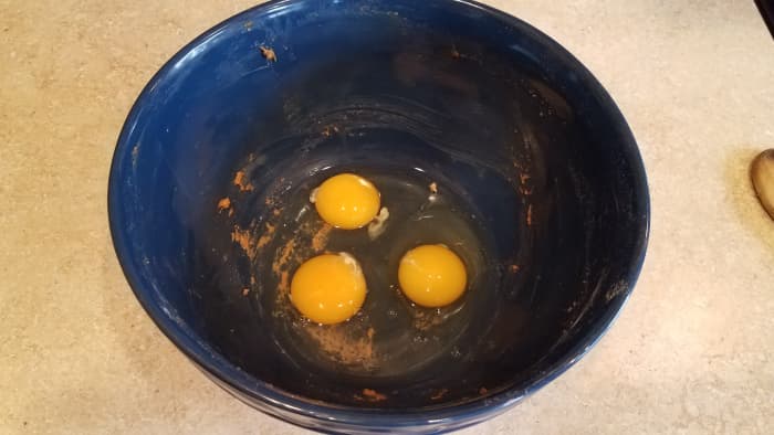 Crack your eggs into a large mixing bowl. (My bowl was just used for making pumpkin spice banana bread. The ingredients were so alike I didn't think it was necessary to wash the bowl out.)