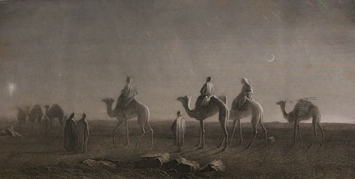Magi, wise men or wise kings travel on camels with entourage across the desert.