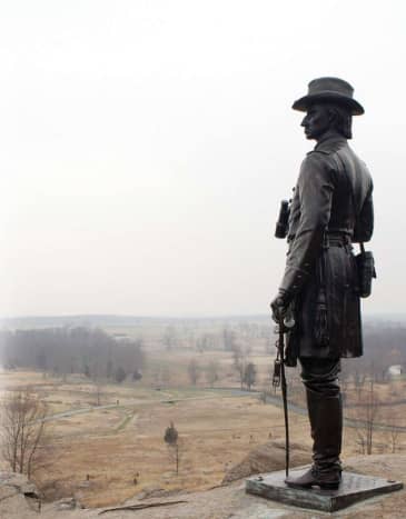 Monument of General Warren overlooking the battlefield from Little Round Top though this photograph was taken in the winter.