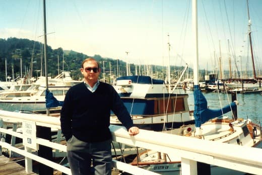 My hubby with the marina as a backdrop - One of the marinas in Sausalito