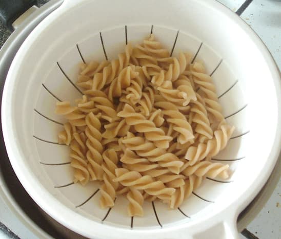 Cooked and drained fusilli pasta