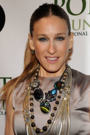 Sarah Jessica Parker's layered necklace style gives an extra edge to her nude dress