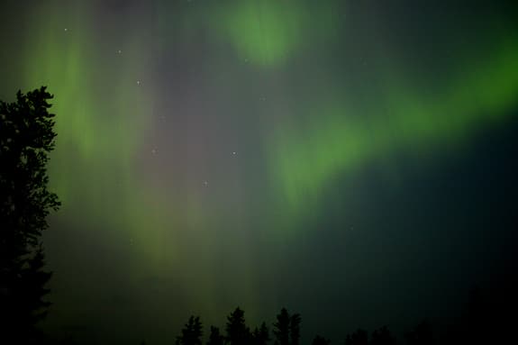 (Northern Lights) is created when particles of energy from the sun interact with the Earth's magnetic field.