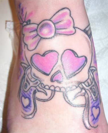 Hello Kitty inspired skull tattoo