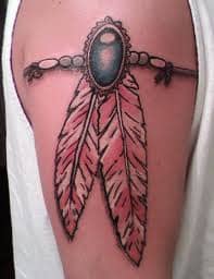 Stunning Native American Feather Tattoo Meanings & Ideas - TatRing