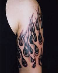 A black and gray flame tattoo.