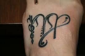 This tattoo depicts the Virgo sign.