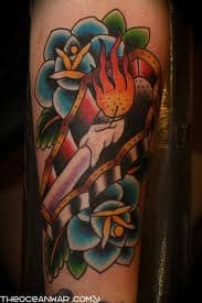 Color Tattoo of a Candle in a Coffin