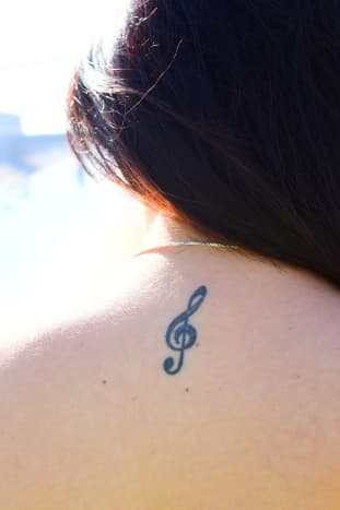 Treble clef tattoo.