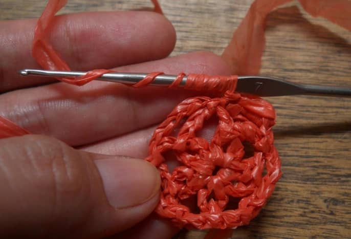 To make a bullion stitch: Wrap yarn 8x on hook.  You can actually wrap the yarn as many times as you like, but wrapping 8x is most popular.