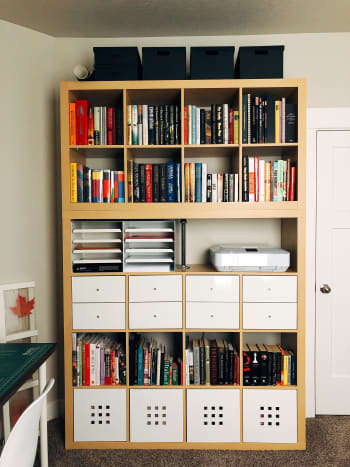 Organize the bookshelves. 