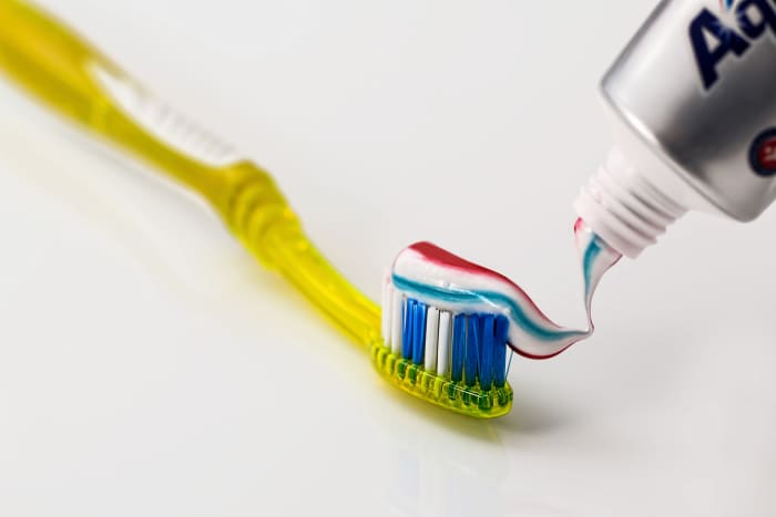 Sodium fluoride, one of the compounds of fluorine, which is one of the toothpaste's ingredients is helpful to reduce the risk of tooth decay.