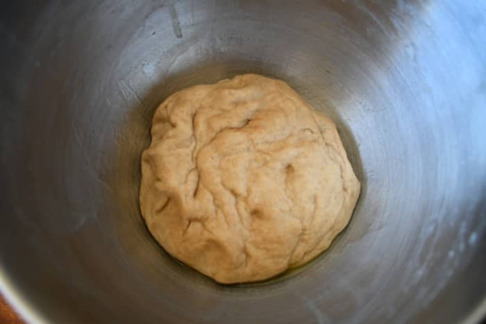 You want to get your dough for the first rise to look like this! Mix together melted butter and milk together, let it chill. In the stand mixer, mix together the egg, sourdough starter, and sugar with the paddle attachment. Add the milk mixture.