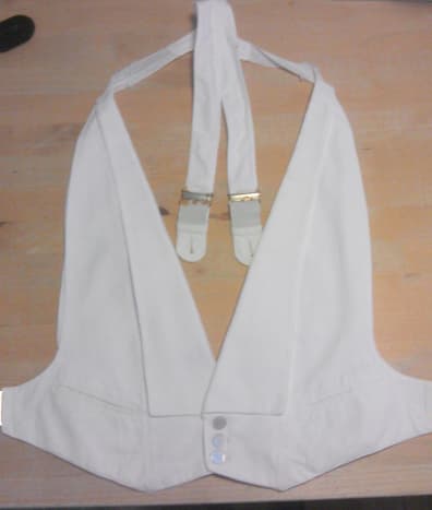 Rare combination white evening dress waistcoat and braces by London city shirtmakers Rendell &amp; Son of Gracechurch St. Cleverly designed, the waistcoat amends the classic backless waistcoat design so that the waistcoat facings become elasticated s