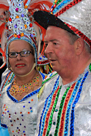 Local people in all their finery show off their extravagant costumes before they begin the parade along the streets