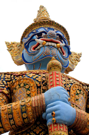 Photographs of Subjects from Around the World. A guardian statue at the Grand Palace, Bangkok, Thailand