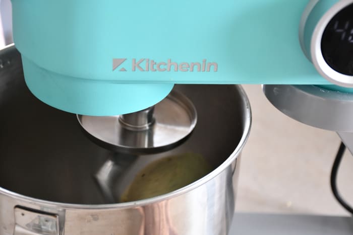 The dough hook, paddle, and whisk attachments will move in a circular motion. The mixer has eight speed settings.