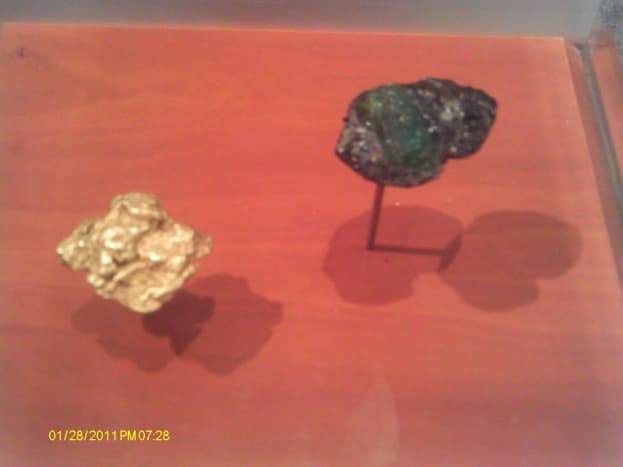 (L) Gold nugget  (R) Emerald