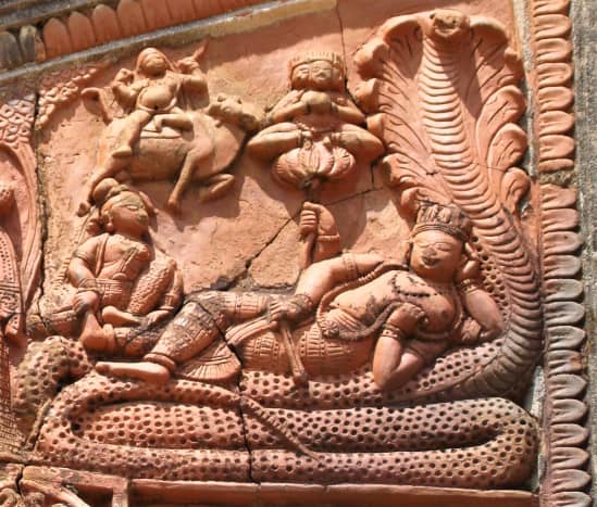 Lord Vishnu on Ananta Naga; terracotta. At Radha Damodar temple in Hadal-Narayanpur, Bankura.
