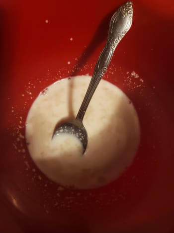Combine 1/4 cup warm water, yeast, and milk into a small mixing bowl.