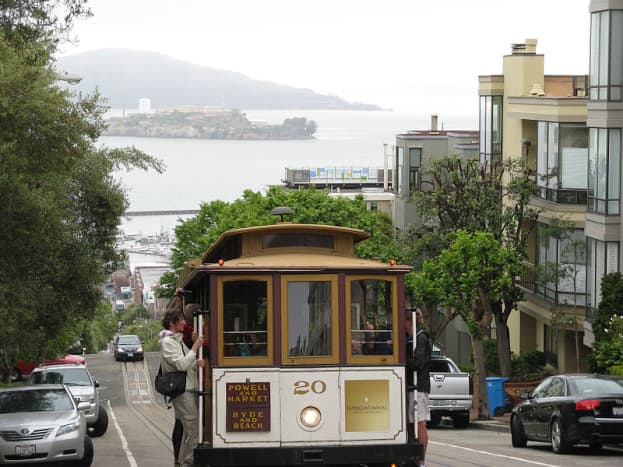 San Francisco cable car with Alcatraz Island in background