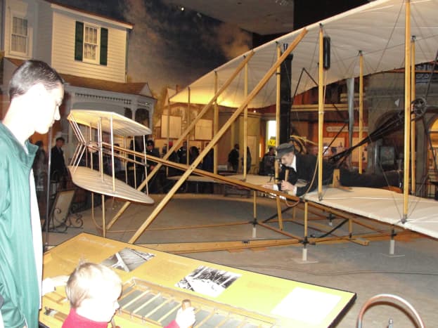 Checking out the 1903 Wright Flyer at the National Air &amp; Space Museum - Did you know the museum almost didn't acquire this piece because of a dispute over who was the first inventor of the airplane: them or Mr. Langley, secretary of the Smithsonian?