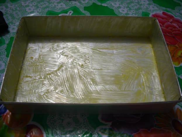 Baking form spreaded with margarine.