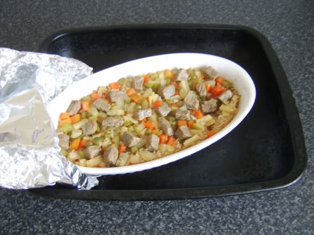 Spicy beef rice casserole is removed from the oven