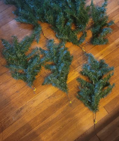 Measure the space where you will hang your garland. Keep this measurement in mind as you work. Separate your branches.
