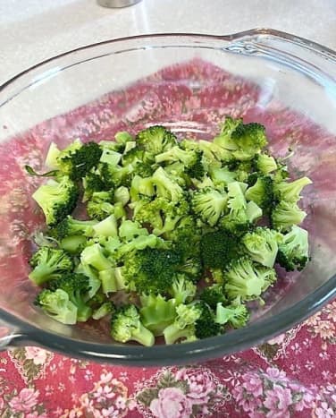 Chop and pre-cook broccoli until tender. 