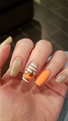 An example of a manicure going for the pumpkin patch effect. 