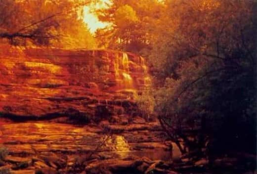 A waterfall in Alabama. I think the orange filter gave it an antique appearance. The actual scene contained no orange at all.