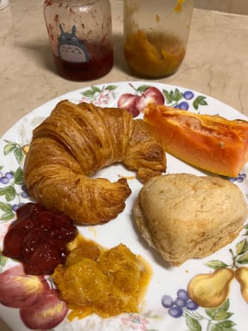Strawberry and orange fruit spread with assorted breads
