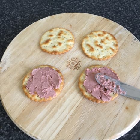 Ardennes pate is spread onto crackers