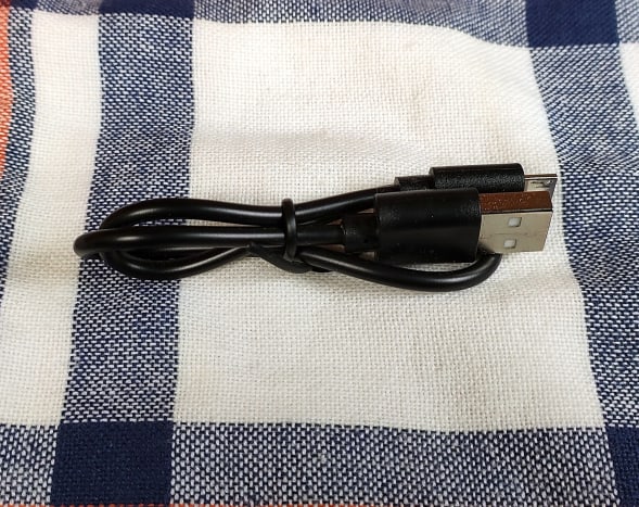 This cable is used to charge the power bank.  You must supply a cable to connect the power bank to the device it is charging