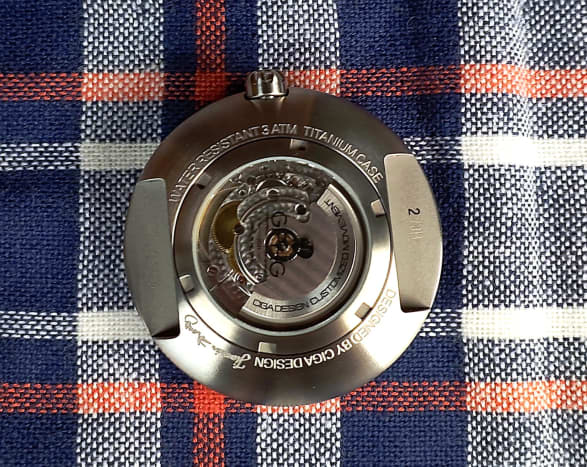 The watch's automatic movement can be viewed from the rear