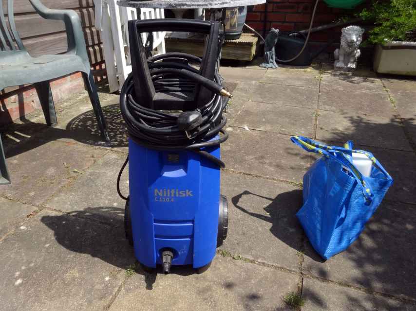 How to Use a Nilfisk Pressure Washer in the Garden Dengarden