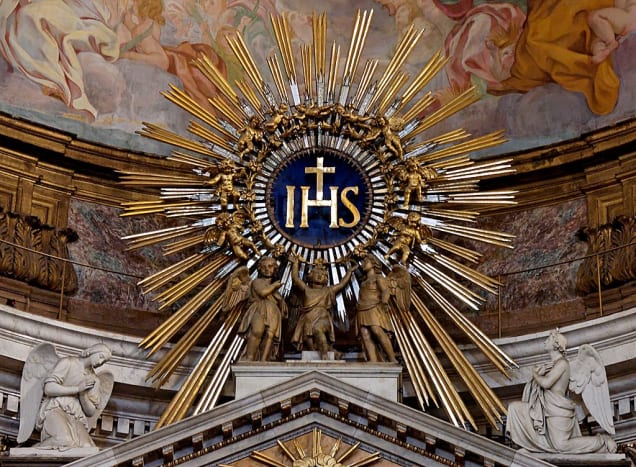 IHS monogram at the top of the main altar at Gesù in Rome, Italy.