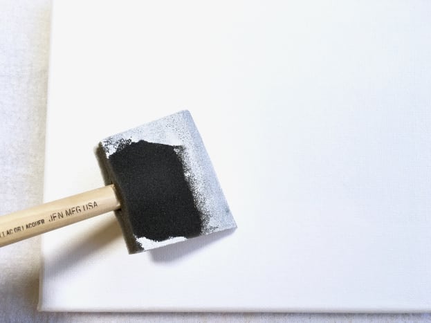 A polyfoam brush is an easy way to apply gesso to a canvas.