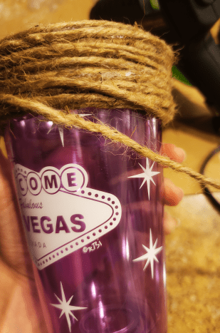Wrap the twine around your cup, securing with hot glue as you go.