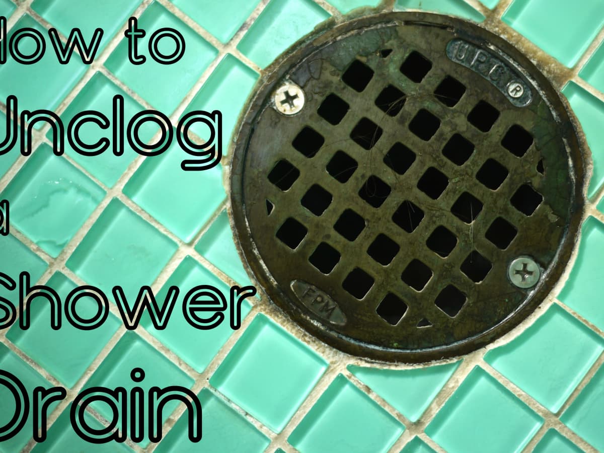 How To Clear A Clogged Shower Drain 8, How To Get Hair Out Of Bathtub Drain With Hanger